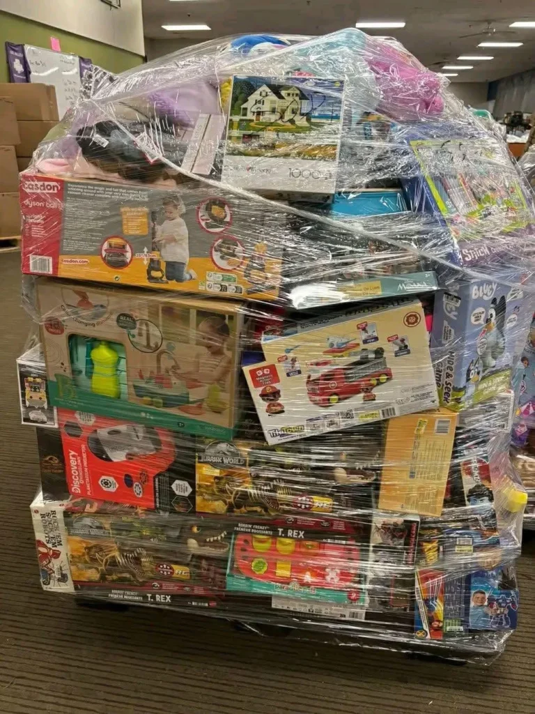 Mixed toys and games for wholesale resale including puzzles, dolls, board games, and action figures