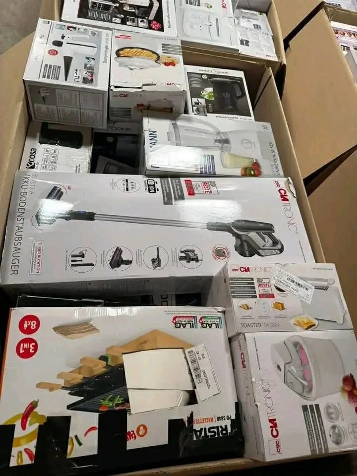 Assorted kitchen appliances including air fryers, blenders, coffee makers, toasters and electric kettles