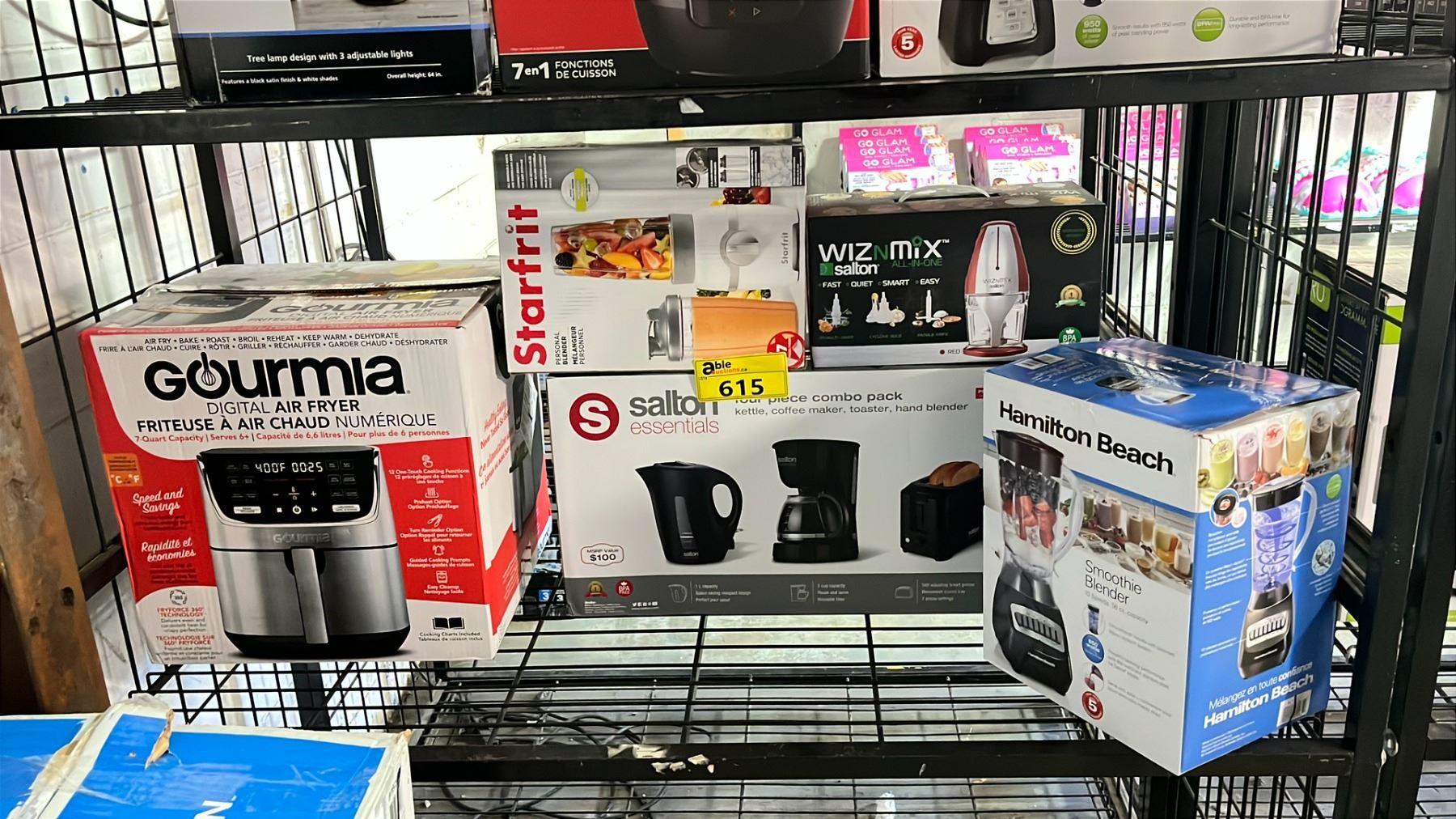 Small household appliances including a vacuum cleaner, electric fan and garment steamer