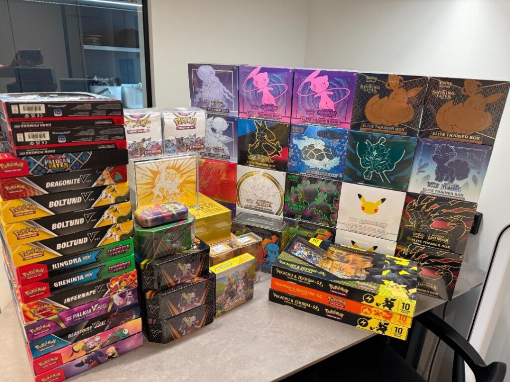 Sealed trading card product boxes and booster bundles for wholesale collectibles inventory