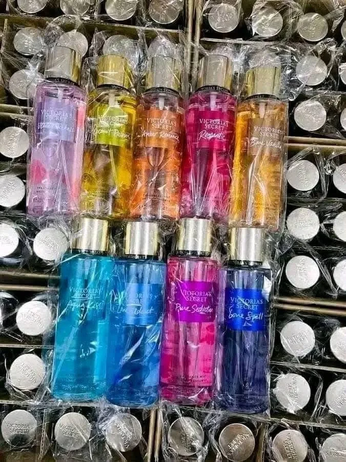 Wholesale fragrance liquidation pallet with assorted perfume bottles and body mists