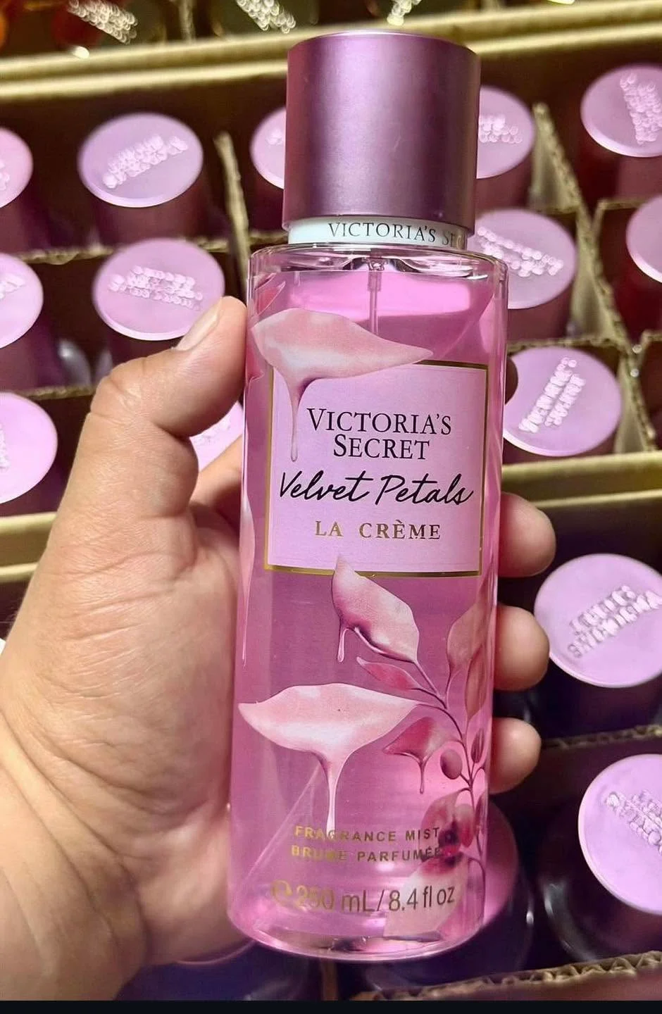 Wholesale fragrance liquidation pallet with assorted perfume bottles and body mists