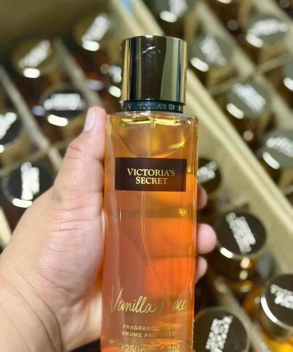 Wholesale fragrance liquidation pallet with assorted perfume bottles and body mists