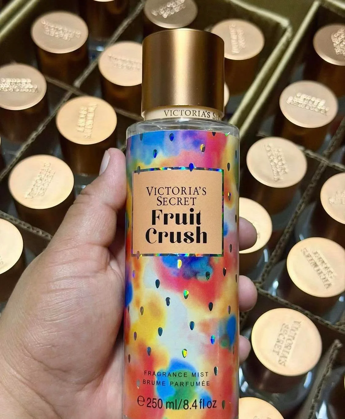 Wholesale fragrance liquidation pallet with assorted perfume bottles and body mists