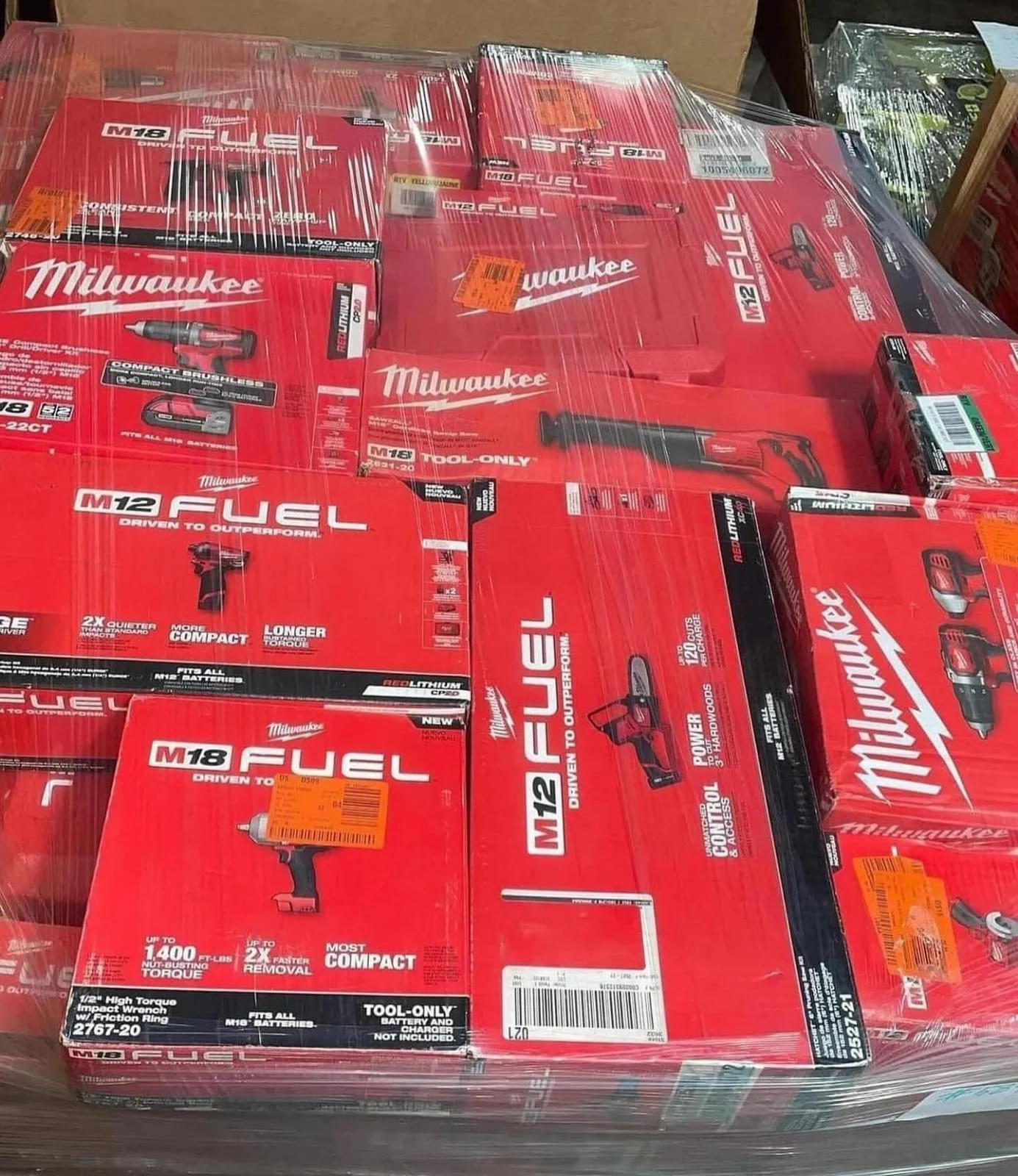 Milwaukee power tools liquidation pallet with assorted cordless drills and impact drivers