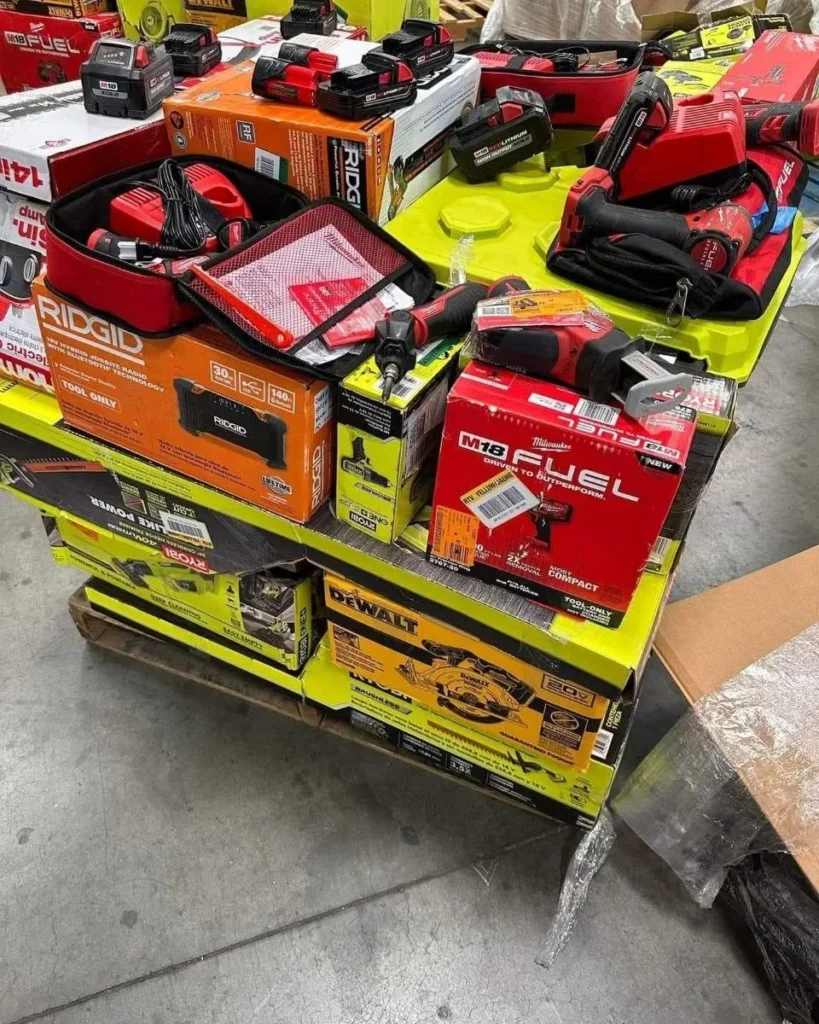 Bulk assortment of power tools, hand-tool sets, measuring tools, and accessories for wholesale resale.
