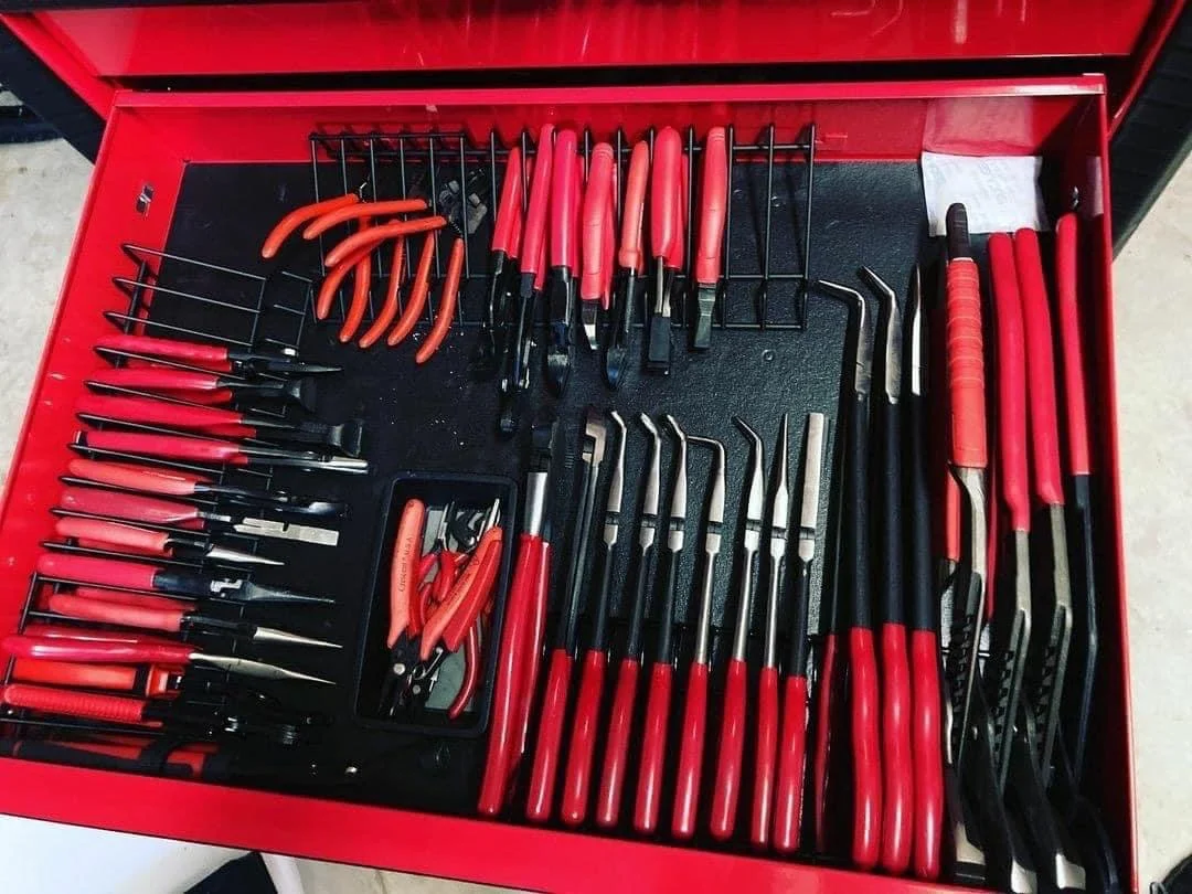 Wholesale Milwaukee tool assortment with batteries, chargers, work lights, and power-tool accessories.