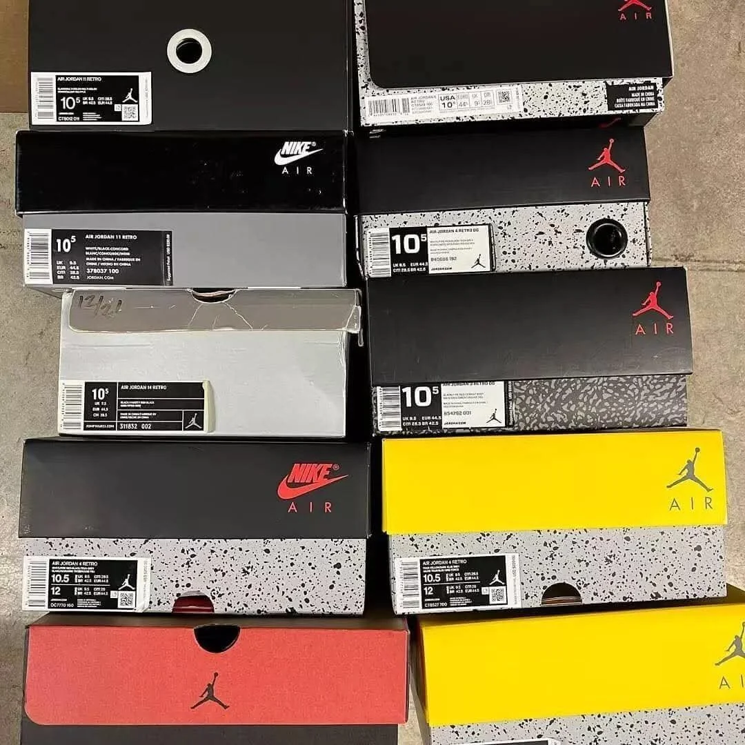 Assorted high-top, mid-top, and low-top basketball sneakers for bulk resale