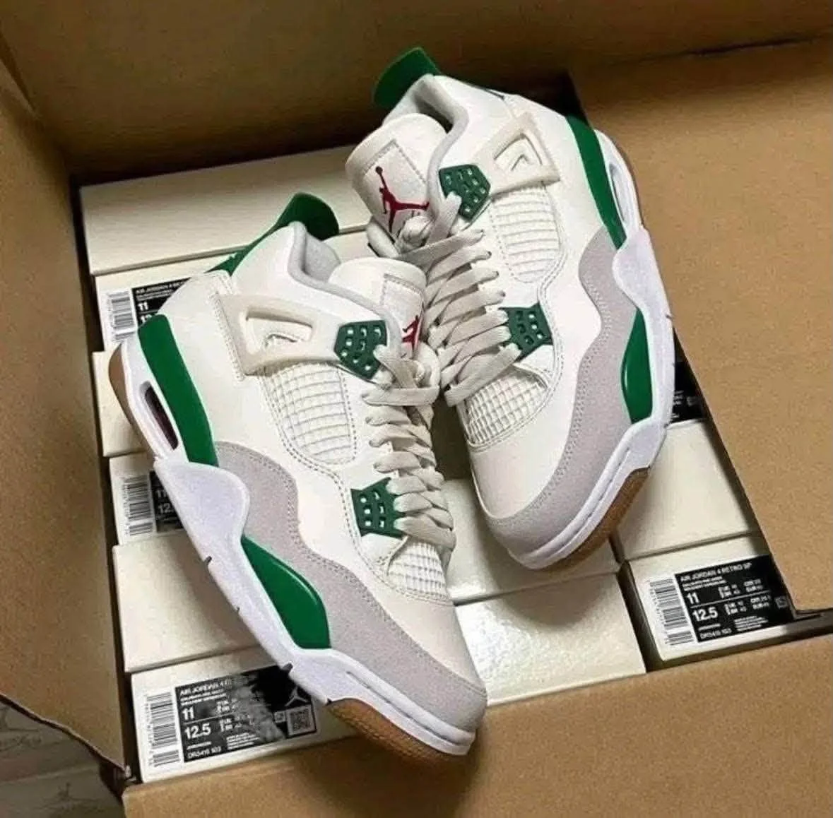 Mixed footwear pallet with assorted sneaker sizes and colorways