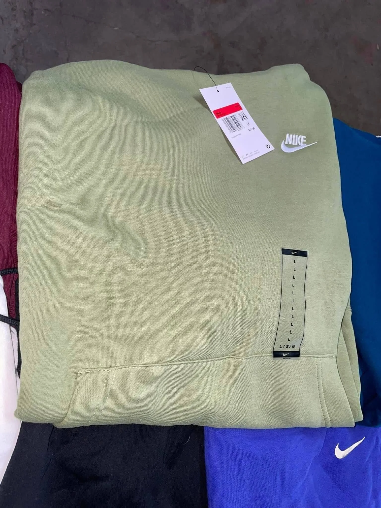 Nike athletic apparel liquidation pallet with assorted sportswear for wholesale resellers