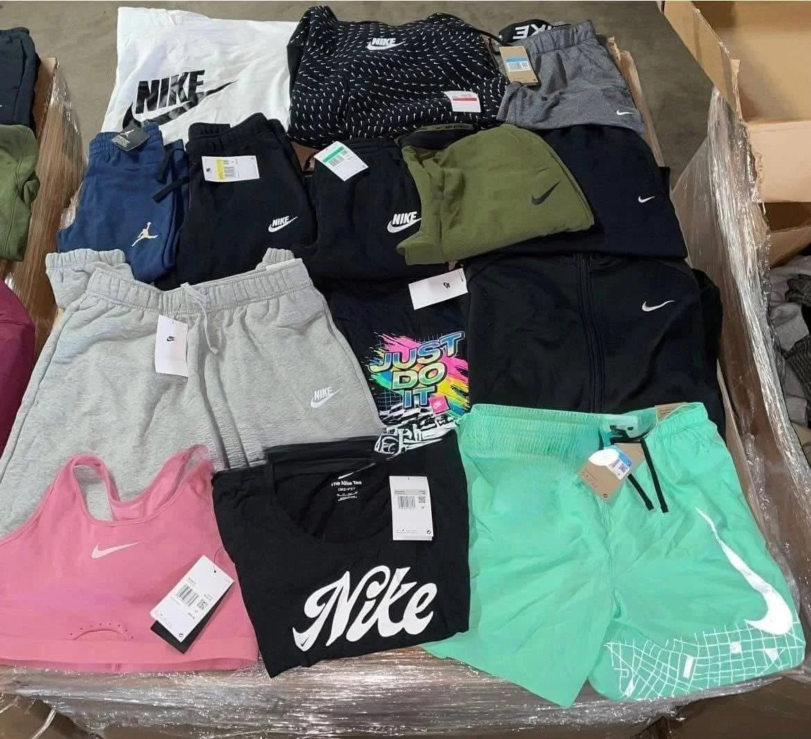 Nike athletic apparel liquidation pallet with assorted sportswear for wholesale resellers
