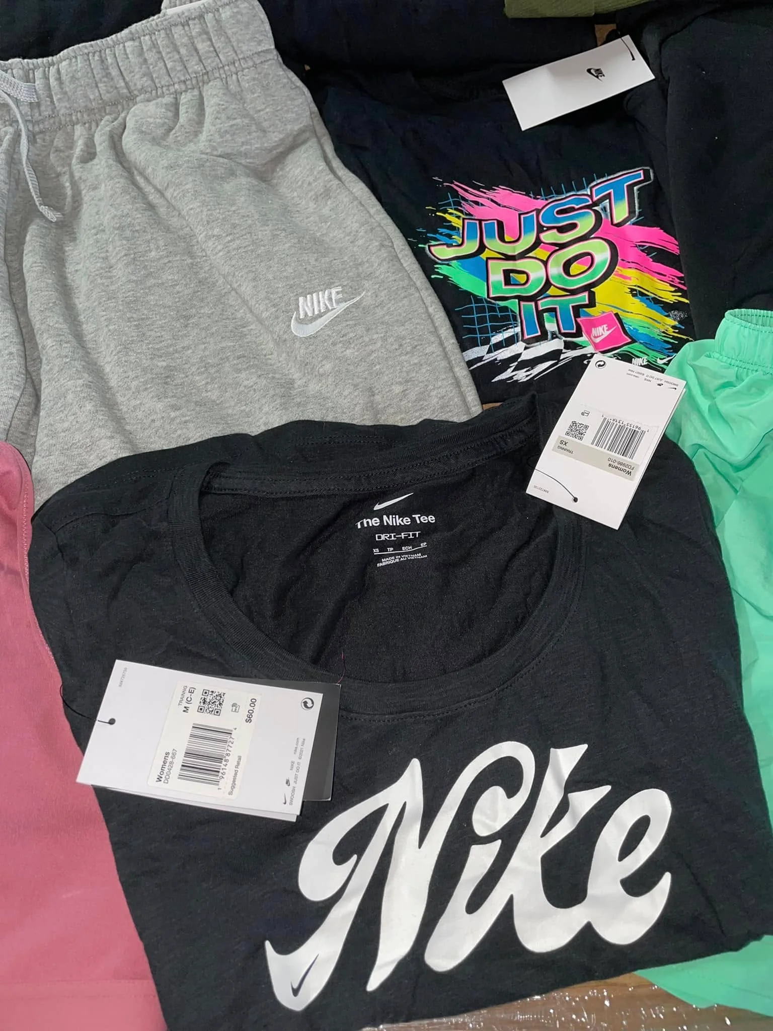 Nike athletic apparel liquidation pallet with assorted sportswear for wholesale resellers