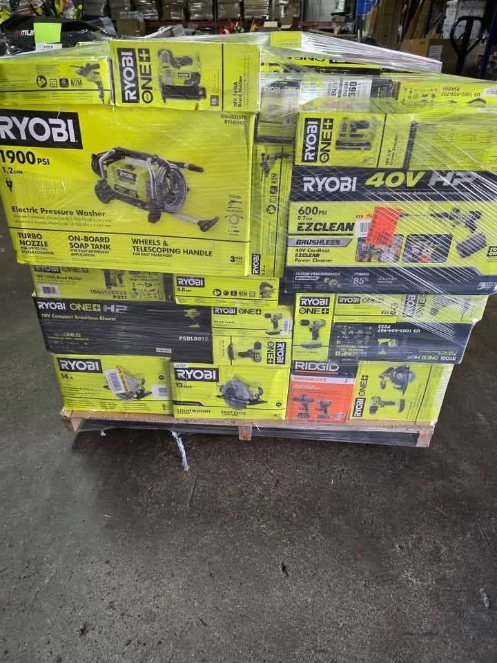 RYOBI pressure washer liquidation pallet with assorted pressure washers, hoses, spray wands, and cleaning accessories