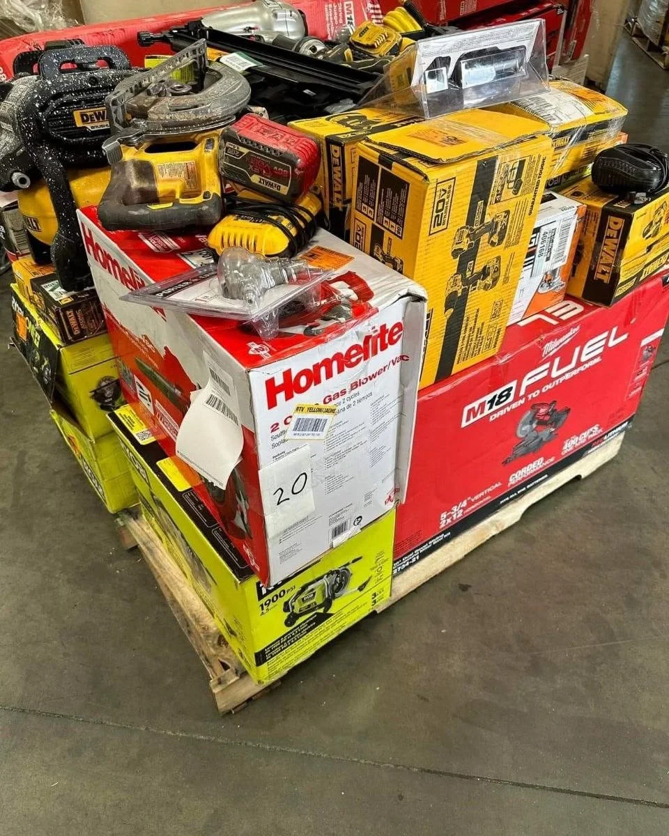Mixed power tool liquidation pallet with cordless drills, impact drivers, saws, grinders, batteries, and accessories