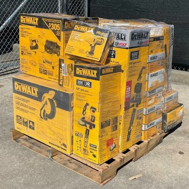 Mixed power tool liquidation pallet with cordless drills, impact drivers, saws, grinders, batteries, and accessories
