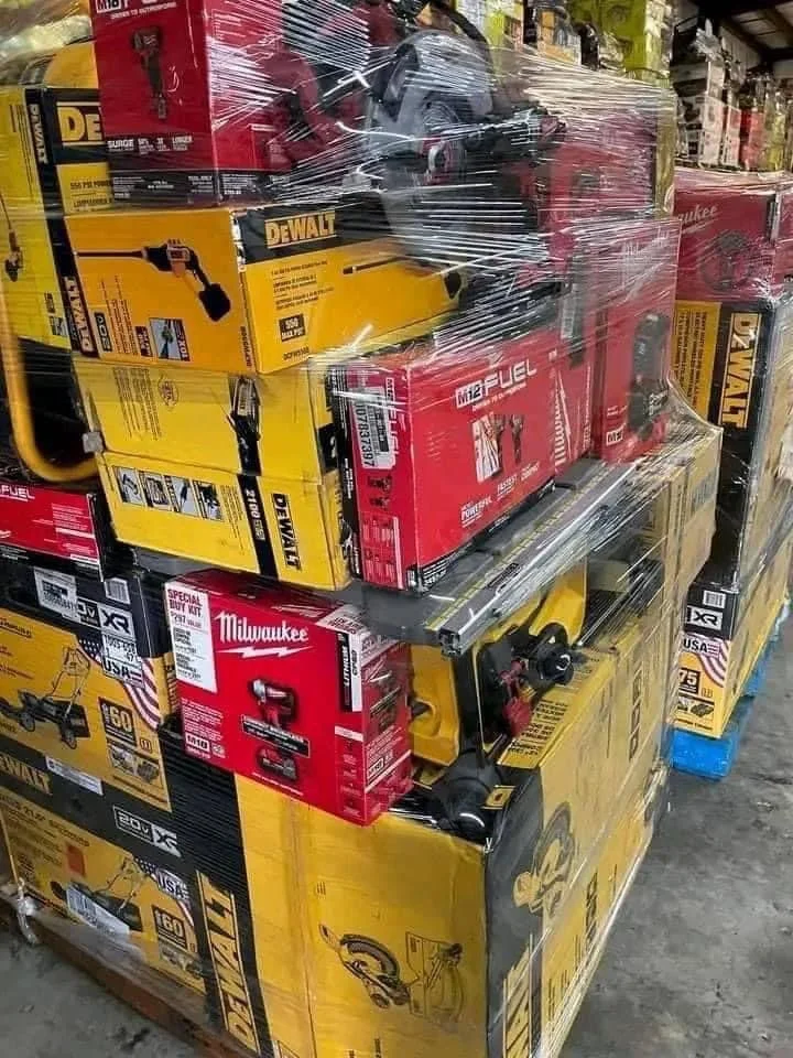 Mixed power tool liquidation pallet with cordless drills, impact drivers, saws, grinders, batteries, and accessories